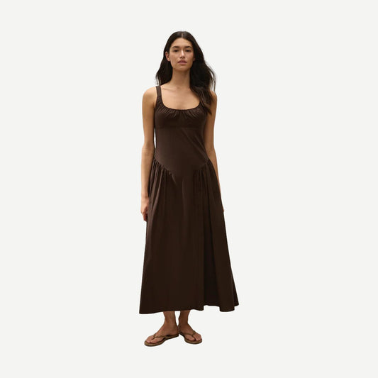 Faithfull The Brand Marcella Midi Dress in espresso, featuring a stylish midi length and lightweight fabric, shown on a model.