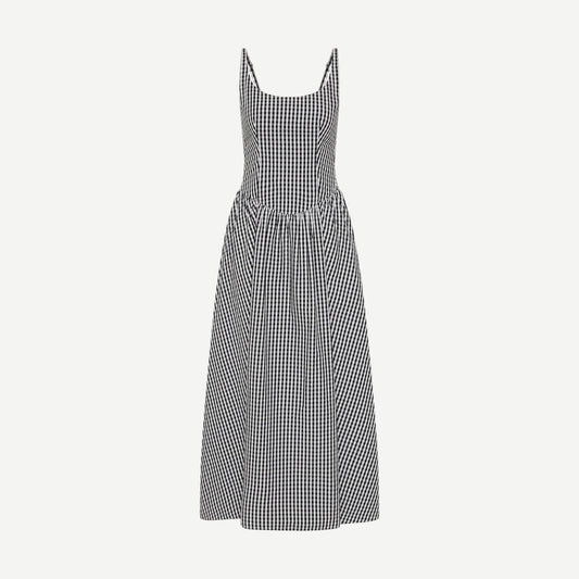 Black Chiara Midi Dress by Faithfull The Brand with textured gingham fabric, stylish and elegant for casual or semi-formal wear.