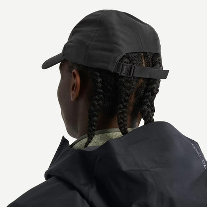 Back view of Arcteryx Bird Word Cap in black, a stylish 24K black hat with the Bird logo, made for casual and outdoor wear.
