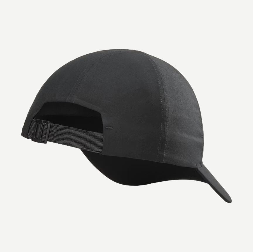 Black Bird Word Cap by Arcteryx featuring a sleek design and adjustable strap, showcasing the brand logo on the back.