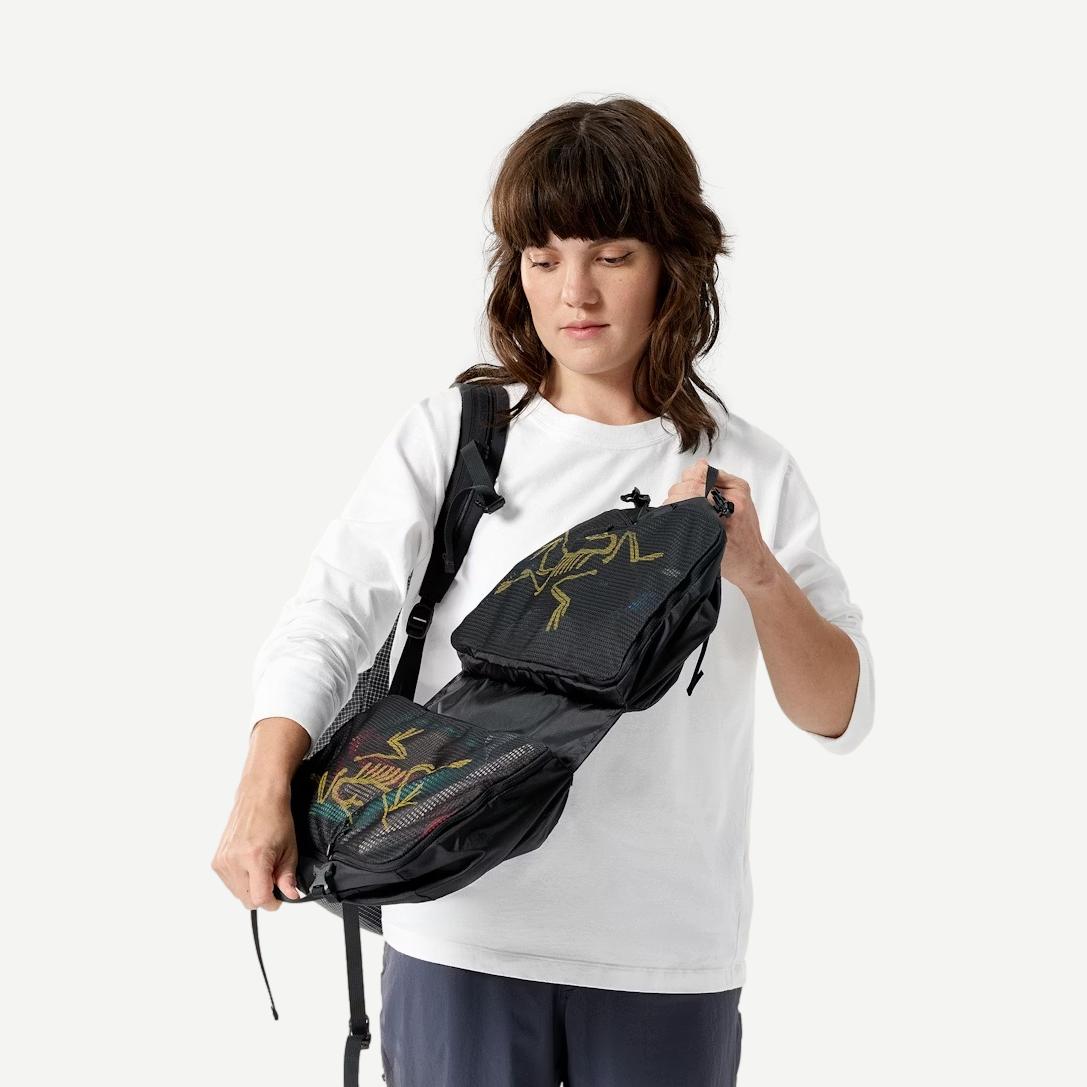 Back view of Arcteryx Index Gear Organizer in sleek 24K black, a compact bag designed for efficient gear storage.