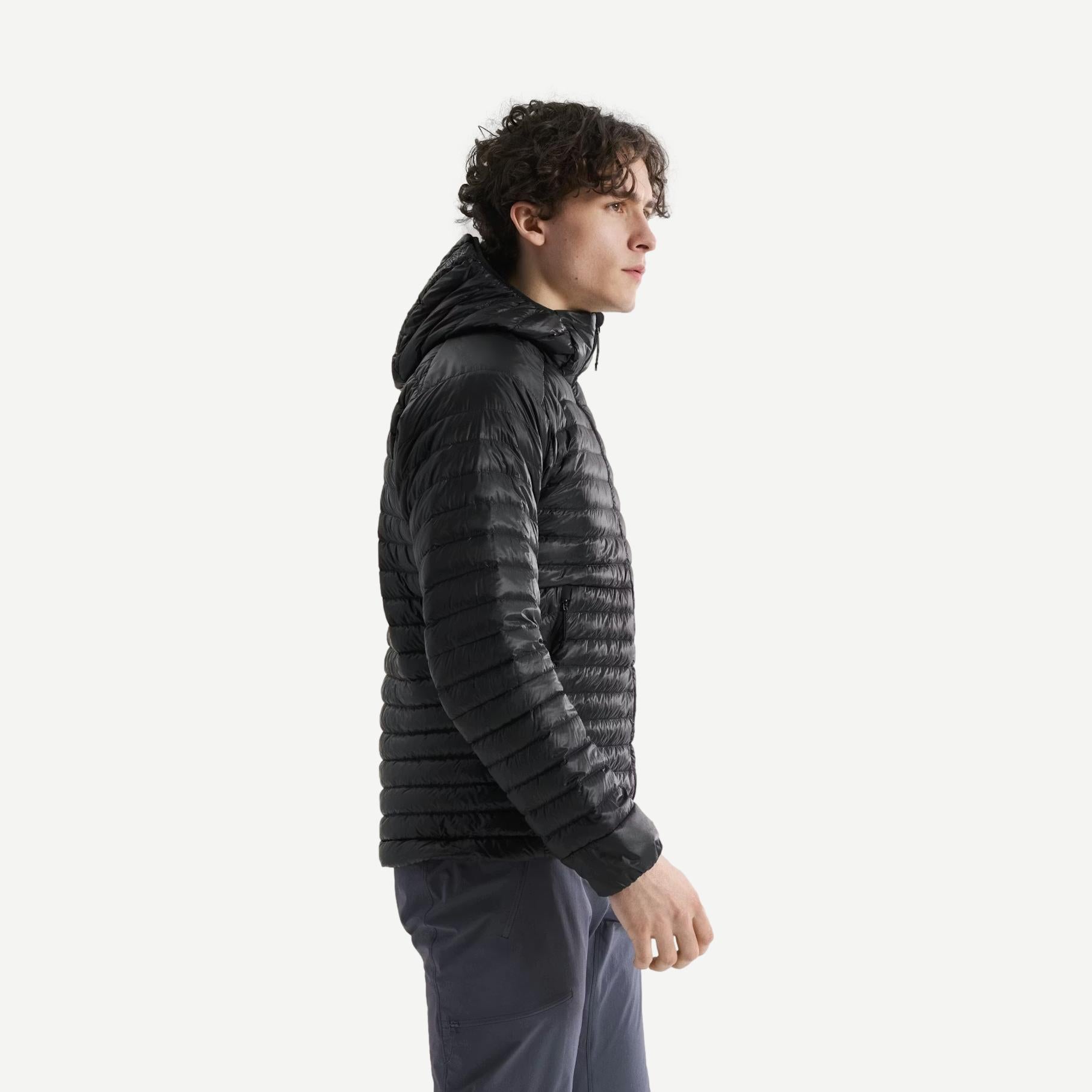 Black Arcteryx Cerium SL Hoody jacket shown from the side view, lightweight down insulation with a sleek, fitted design.