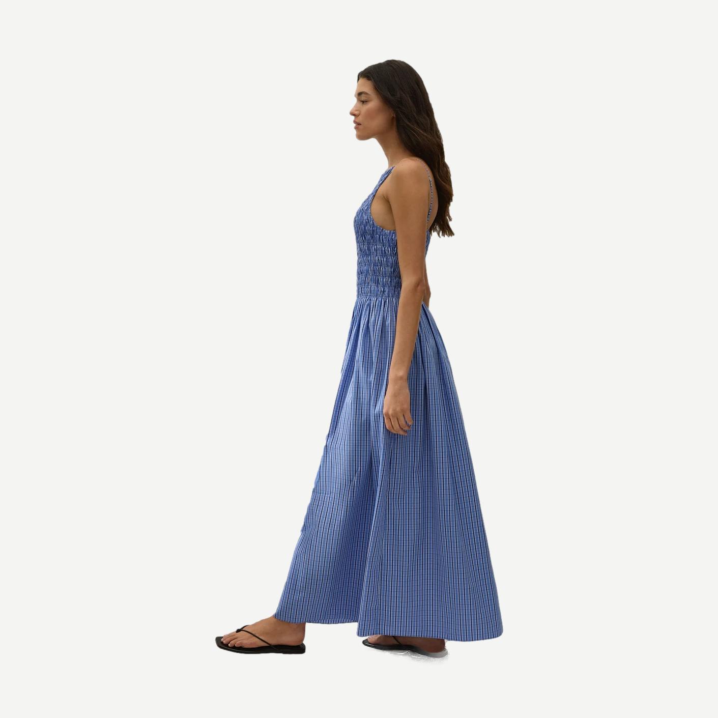 Faithfull The Brand Laia Maxi Dress in Sotto fabric, flowing boho style with tiered design and adjustable straps.