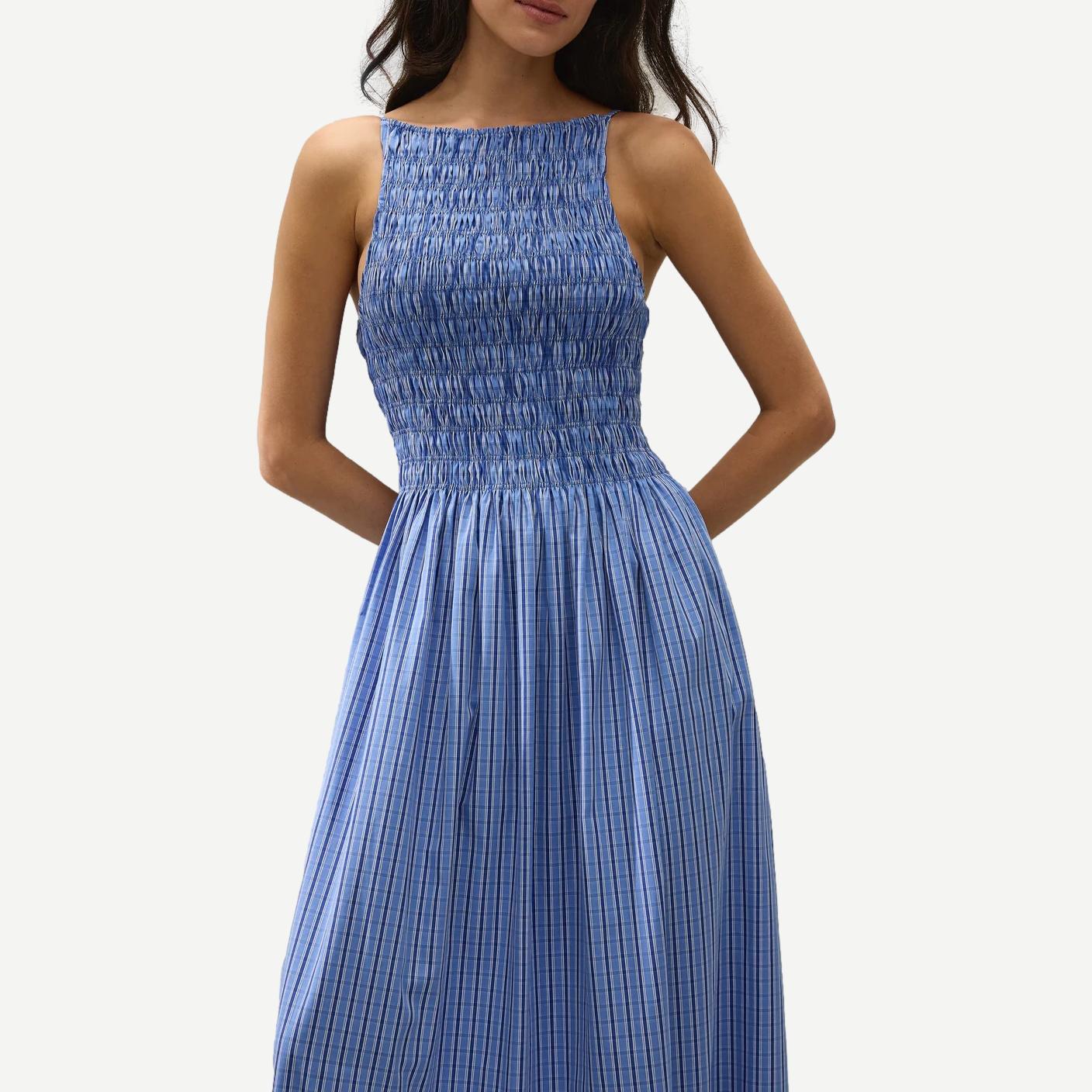 Faithfull The Brand Laia Maxi Dress in Sotto fabric, flowing design with floral pattern, sleeveless and ankle-length.