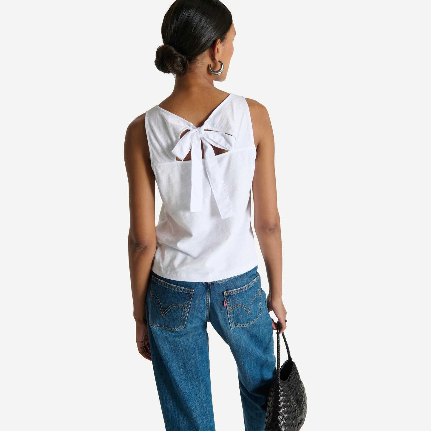 White Nation LTD Sammi Tie Back Tank top with a stylish back tie and sleeveless design, perfect for casual wear.