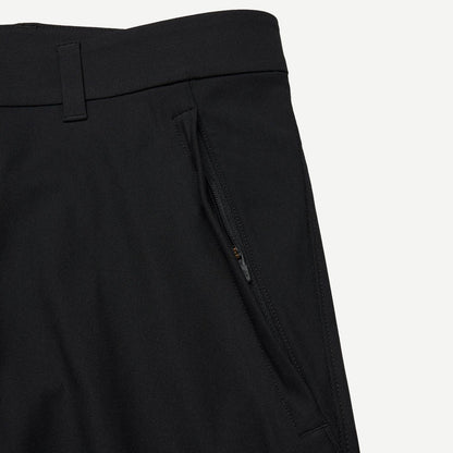 Black Stretch Warp Knit Coach's Slim Pant by Reigning Champ, showing the sleek, fitted design and smooth fabric details.