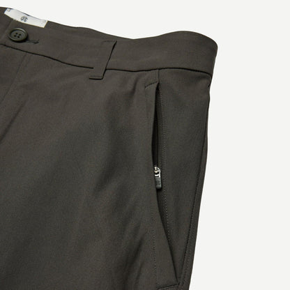 Reigning Champ Stretch Warp Knit Coach's Slim Shorts 9-inch in carbon color, featuring a close-up view of the fabric and fit.