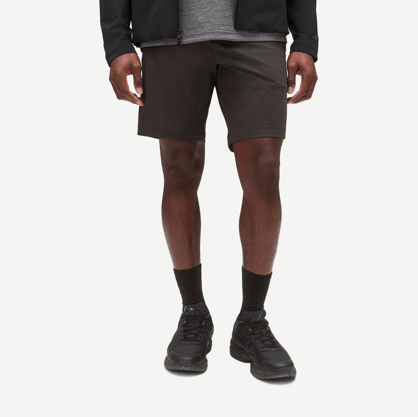 Reigning Champ Stretch Warp Knit Coach's Slim Shorts 9-inch in carbon color, featuring a close-up of the fitted athletic shorts.