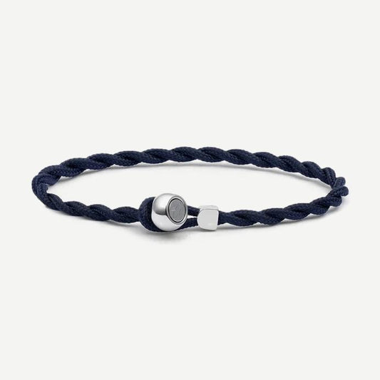 Navy and silver bracelet from Pig & Hen's PH Easy Ed collection featuring woven design and metallic accents.