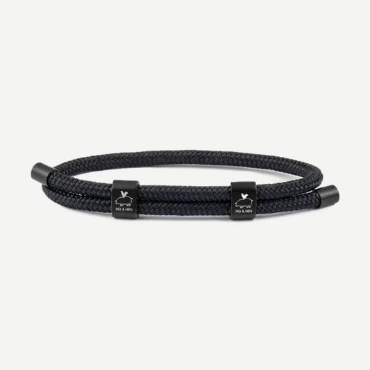 Black and black PH Little Lewis double bracelet by Pig & Hen featuring sleek cord design and metallic accents.