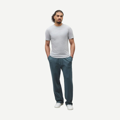 Reigning Champ lightweight grey jersey slim T-shirt displayed flat, showcasing its soft fabric and classic crew neck design.