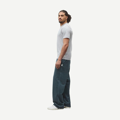 Reigning Champ lightweight grey jersey slim T-shirt displayed on a hanger, close-up of fabric texture and fit.