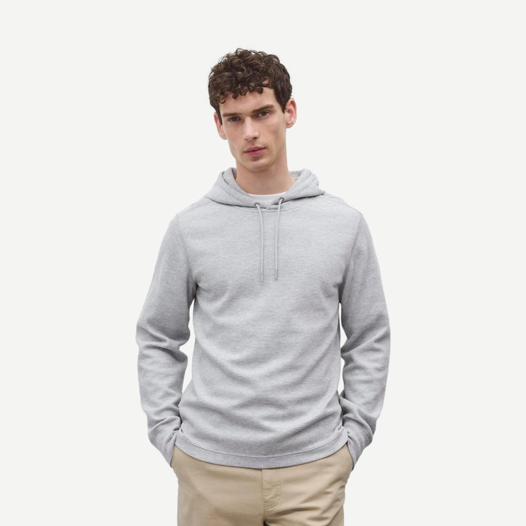 Reigning Champ lightweight waffle hoodie in heather grey, soft sweatshirt with a relaxed fit and subtle branding.