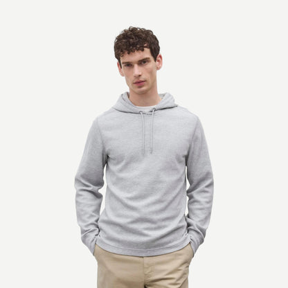 Reigning Champ lightweight waffle hoodie in heather grey, soft sweatshirt with a relaxed fit and subtle branding.