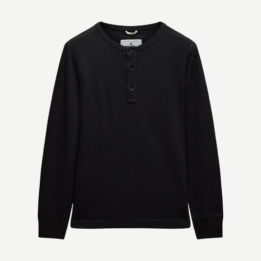 Reigning Champ lightweight black waffle henley shirt, standard fit, with a crew neckline and long sleeves.