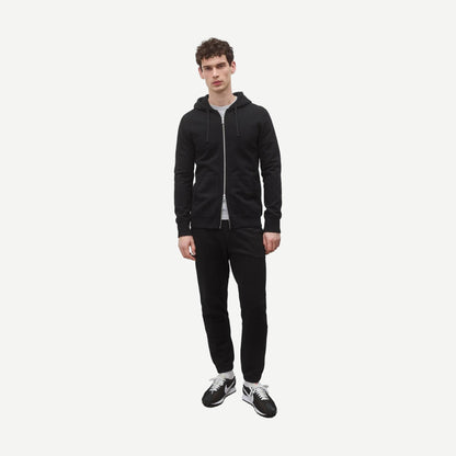 Black Reigning Champ midweight terry slim zip hoodie, front view showing hood, zipper, and relaxed fit, casual sweatshirt for men and women.