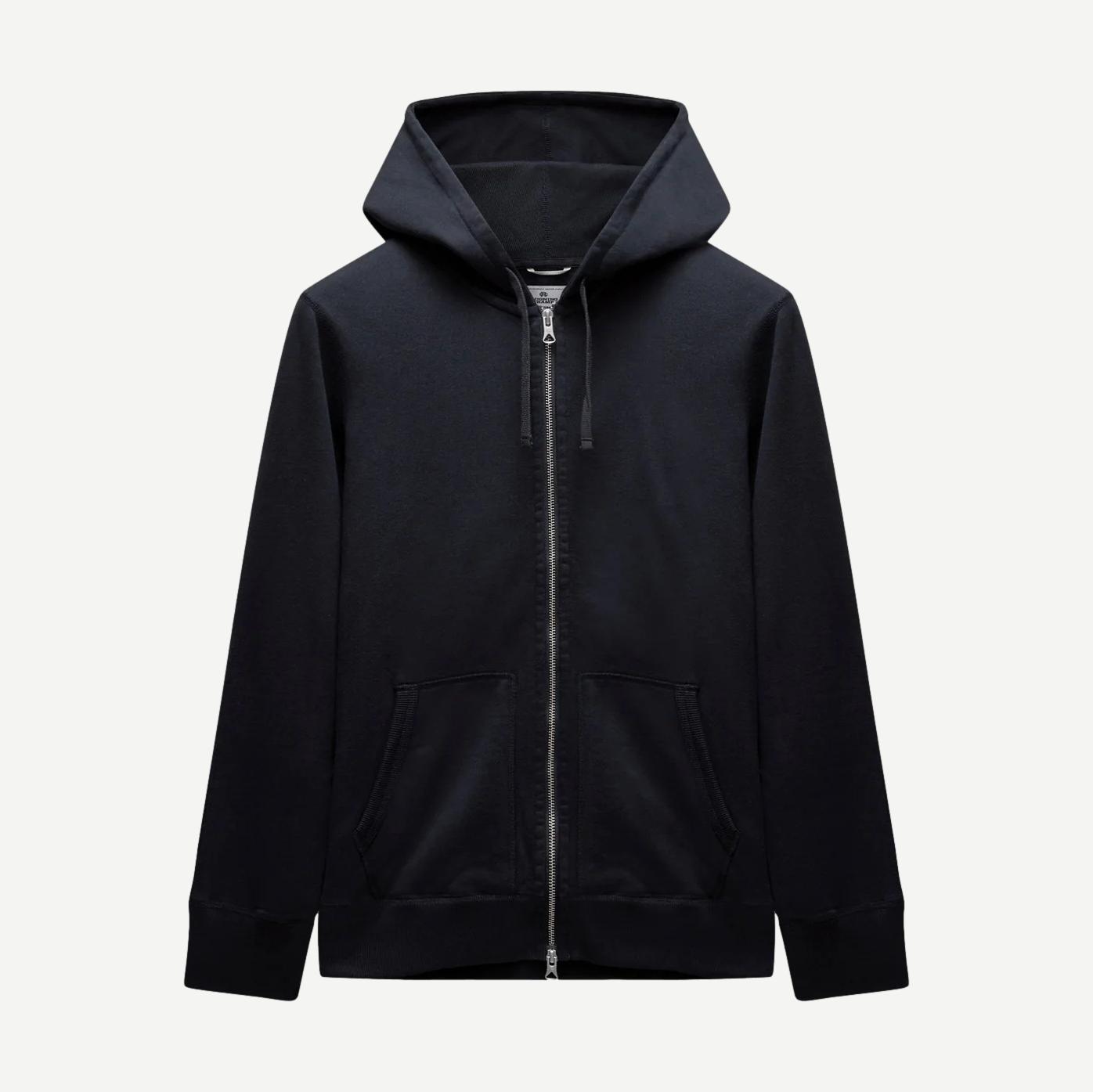 Reigning Champ navy midweight terry slim zip hoodie sweatshirt with a front zipper and hood, displayed on a hanger.