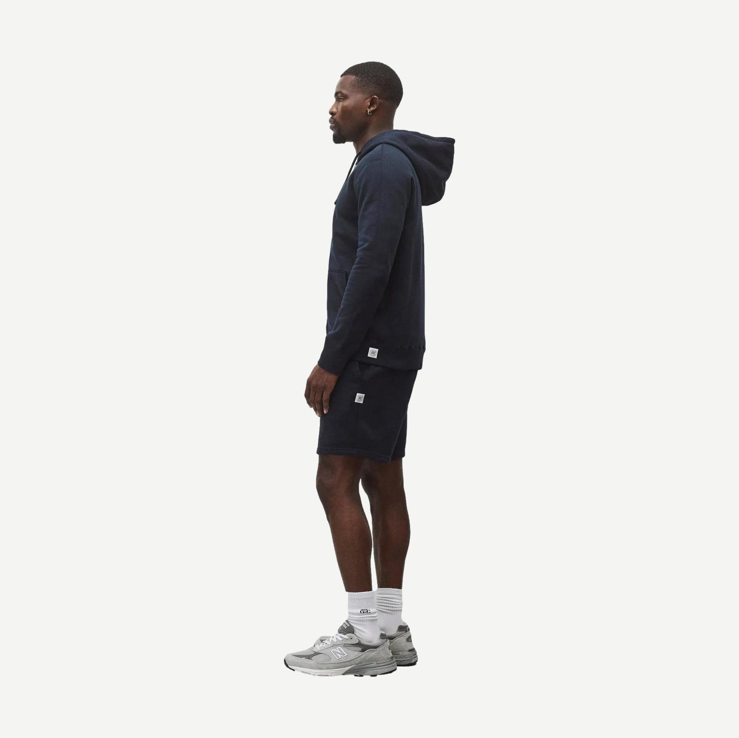 Reigning Champ navy midweight terry zip hoodie with slim fit, front zip closure, and comfort-fit design.