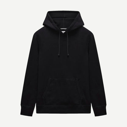 Black Reigning Champ midweight terry slim hoodie, front view showing the classic sweatshirt fit and minimal branding.
