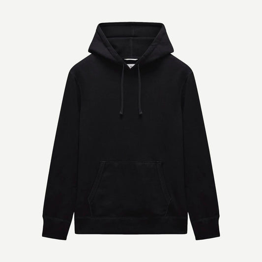 Black Reigning Champ midweight terry slim hoodie, front view showing the classic sweatshirt fit and minimal branding.