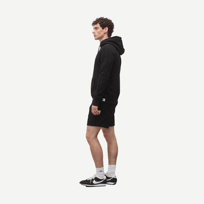 Black Reigning Champ Midweight Terry Slim Hoodie sweatshirt showing the fitted design and soft fabric texture.