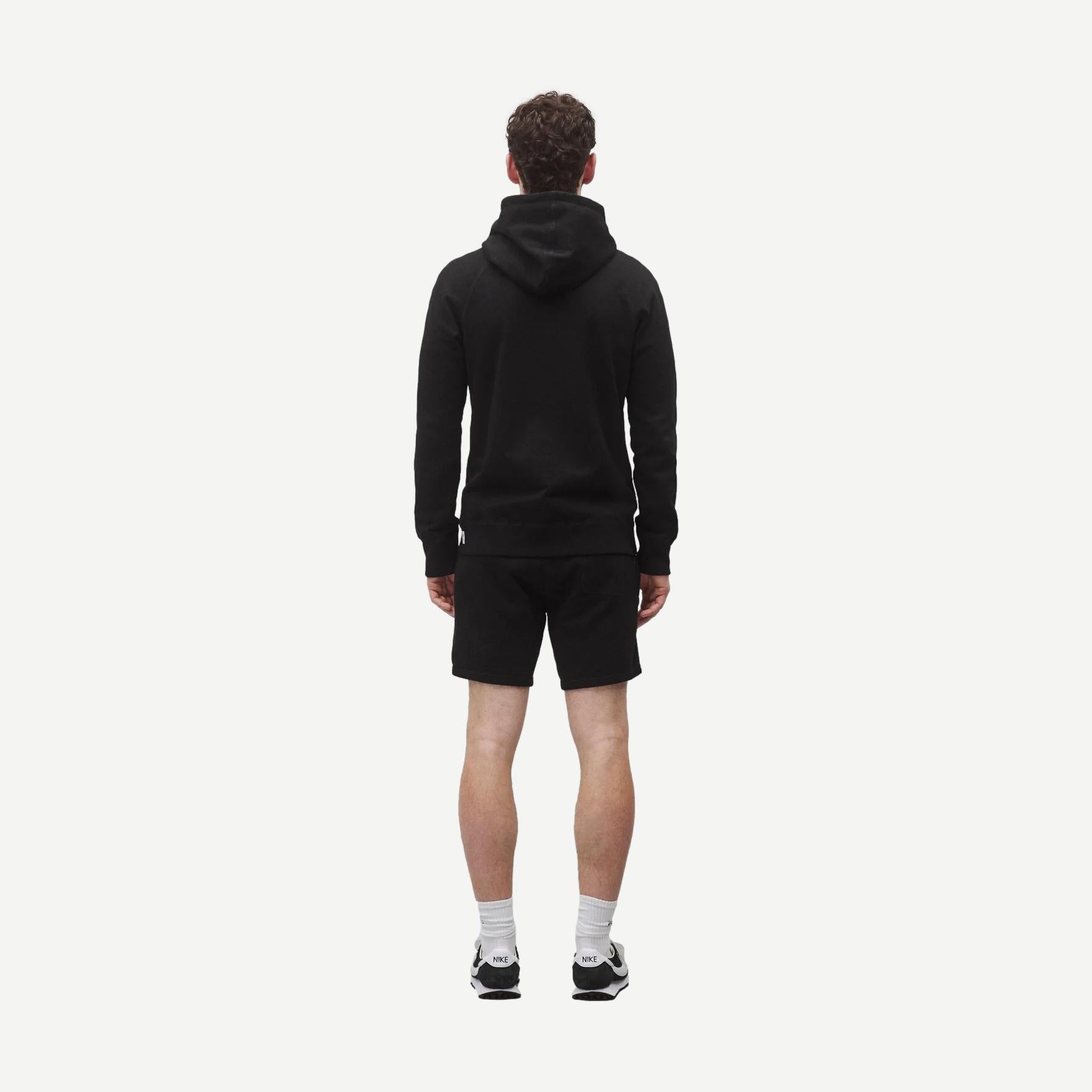 Black Reigning Champ midweight Terry slim hoodie sweatshirt with a relaxed fit and subtle branding.