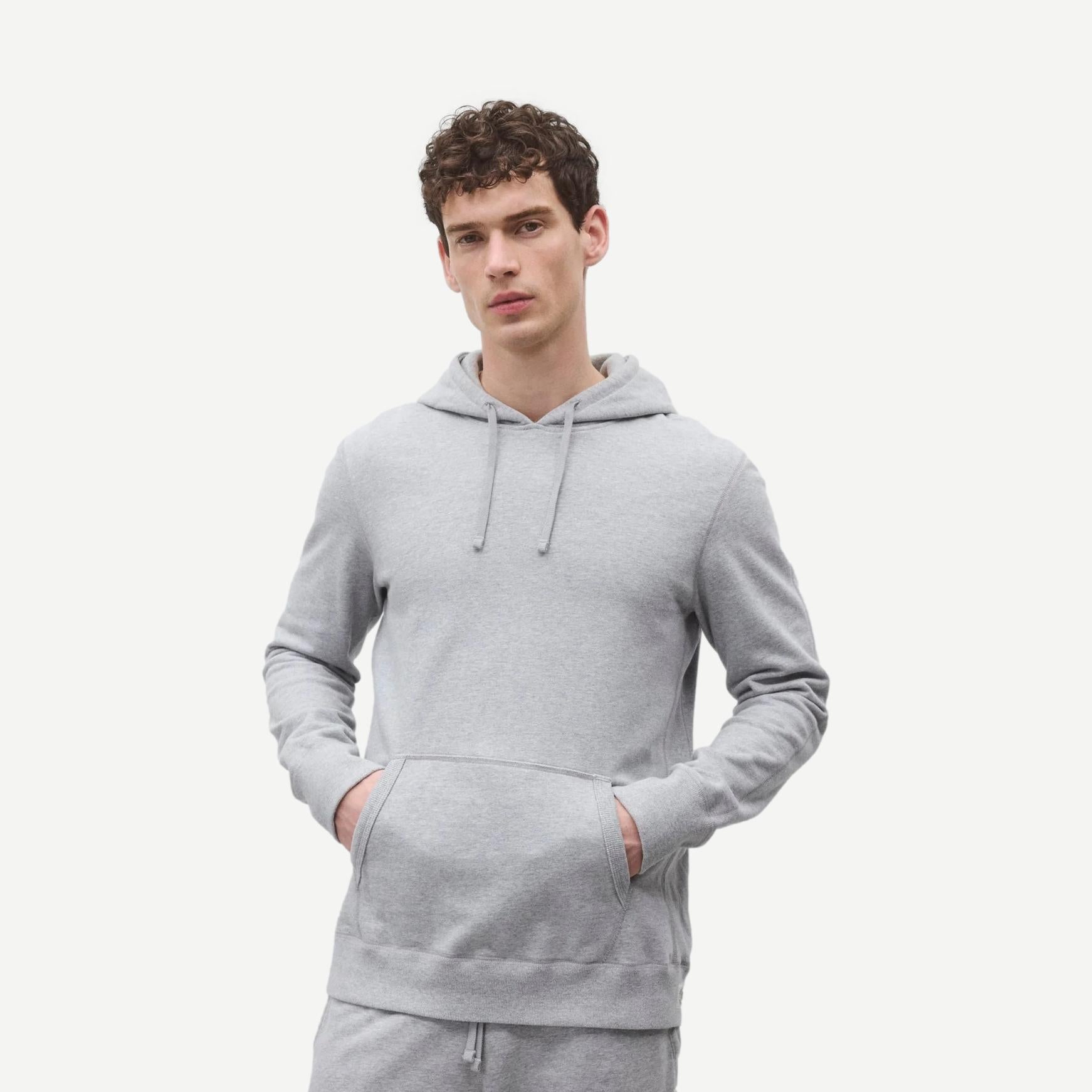 Reigning Champ men's midweight terry slim hoodie in Heather Grey, soft fabric with a relaxed fit and classic sweatshirt design.