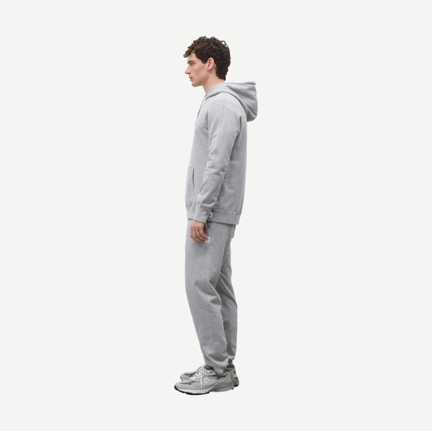 Reigning Champ midweight Terry slim hoodie in Heather Grey, showcasing its soft fabric and fitted style.