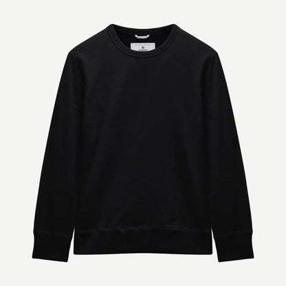 Black Reigning Champ midweight terry slim crewneck sweatshirt displayed on a neutral background.