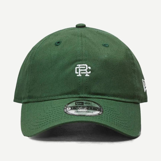 Reigning Champ New Era 9Twenty mini monogram cap in British Racing Green, stylish casual hat with adjustable strap.