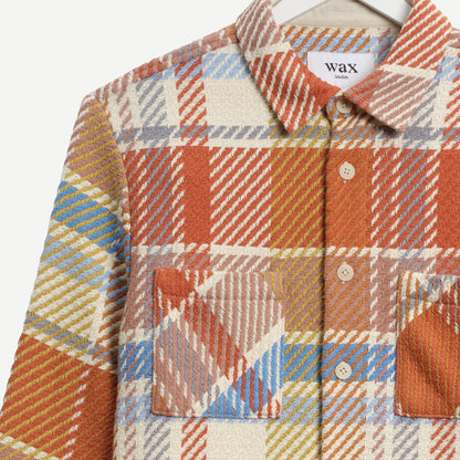 Wax London Whiting overshirt featuring a pastel multi Bude check pattern and button detail.