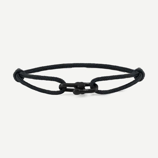 Black and black PH Daunting Dean bracelet by Pig & Hen, featuring sleek leather and metal details.