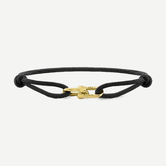 Black and gold bracelet from Pig & Hen's PH Daunting Dean collection, featuring a stylish and modern design.
