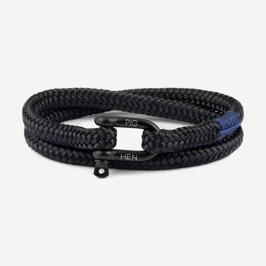 Black and black saltwater bracelet by Pig & Hen featuring a sleek, modern design with adjustable cord and metal accents.