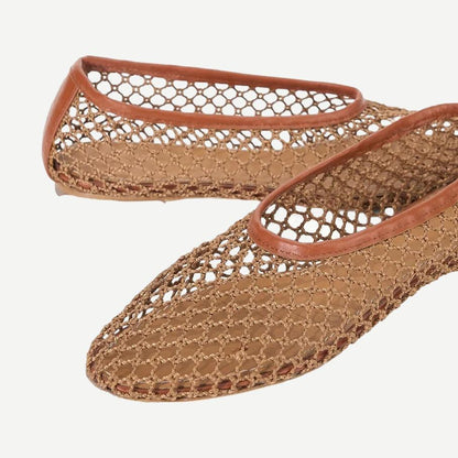 Staud Alba Ballet footwear with tan netting, showcasing a stylish ballet flat design with delicate netted detailing.