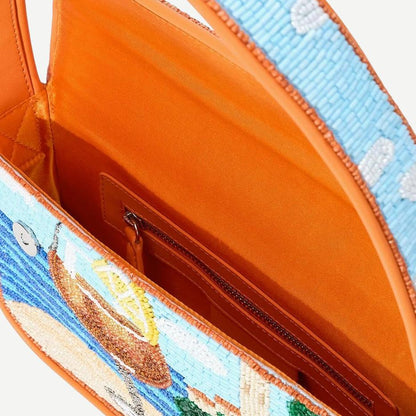Staud Tommy Beaded Bag in Sunset Spritz with colorful beaded design, small rectangular purse with a wrist strap.