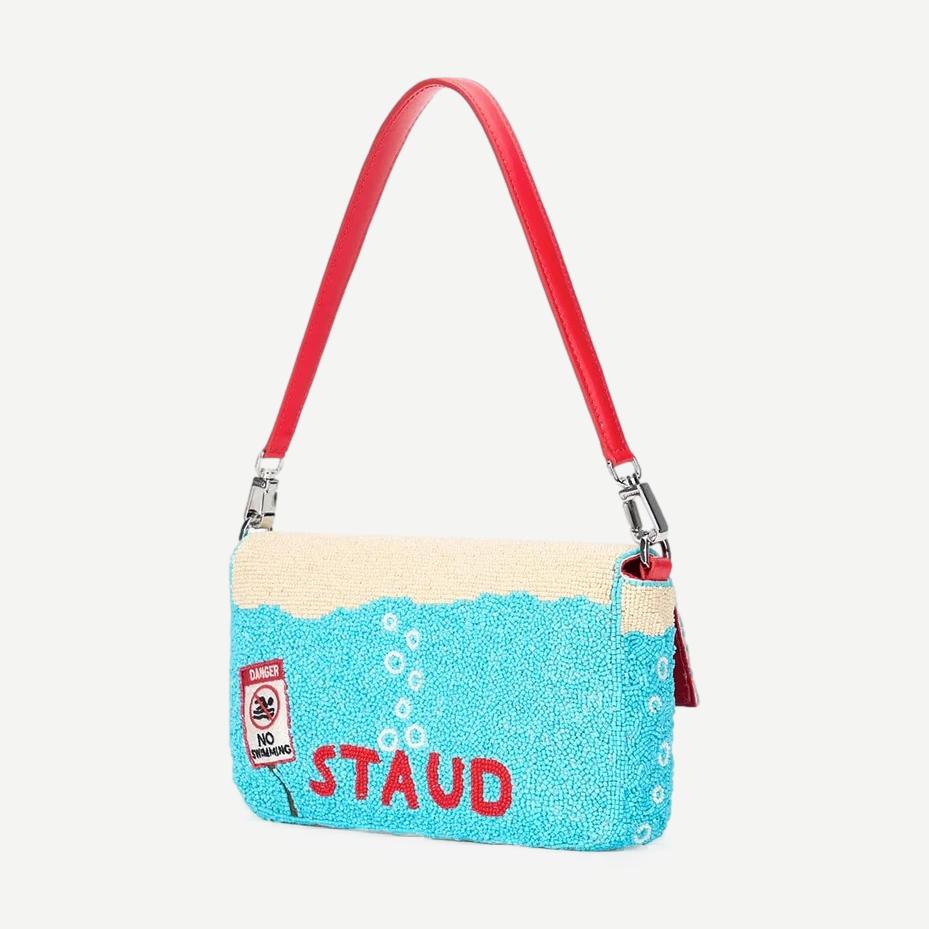 Staud Timmy Convertible Shoulder Bag in Great White, stylish purse with a sleek design, featuring a shoulder strap and modern look.