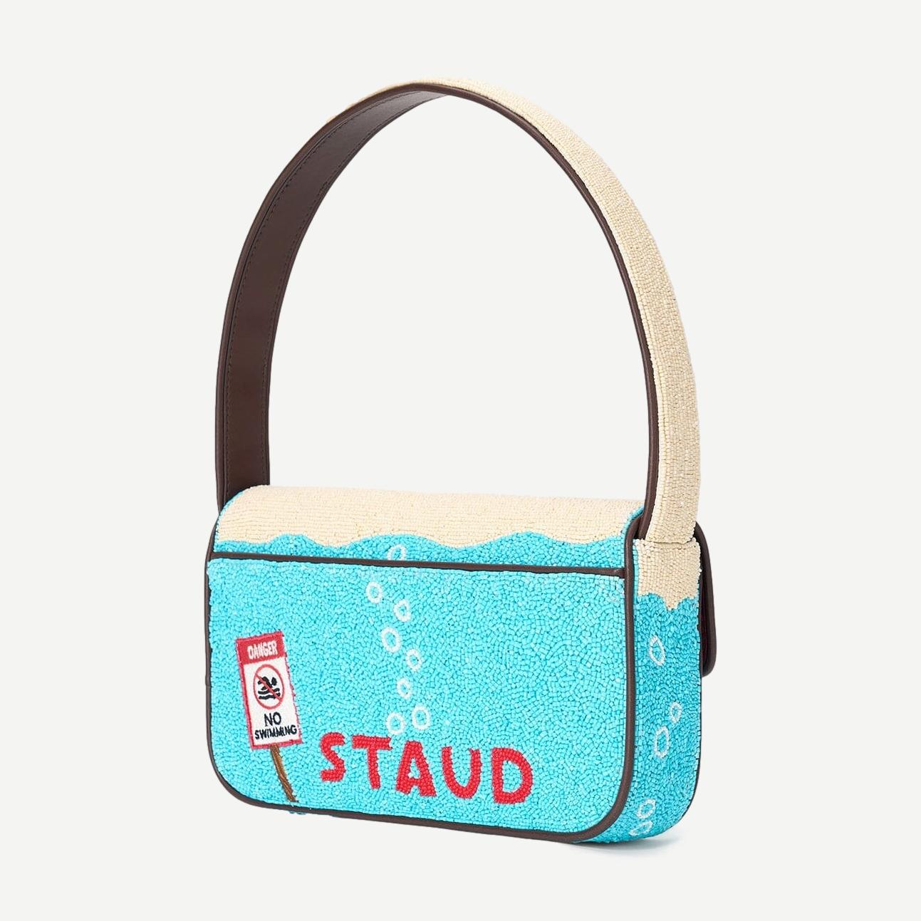 Staud Tommy beaded purse in great white with intricate beaded design, featuring a compact, stylish shape and textured surface.