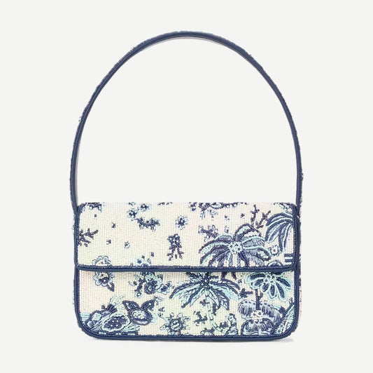 Staud Tommy beaded purse in Toile De Pup pattern with intricate beadwork and compact design, ideal for stylish accessories.