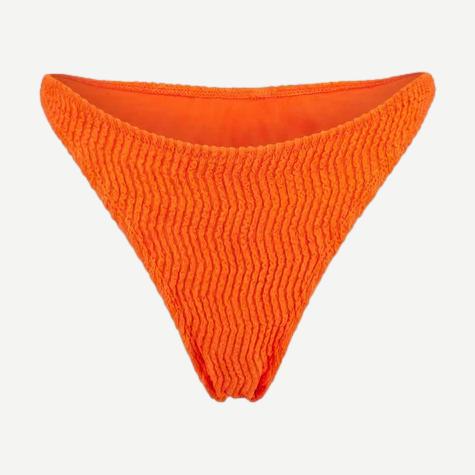 Solid and Striped The Ember Bottom swimwear in Habanero, featuring vibrant orange bikini bottom with side ties.