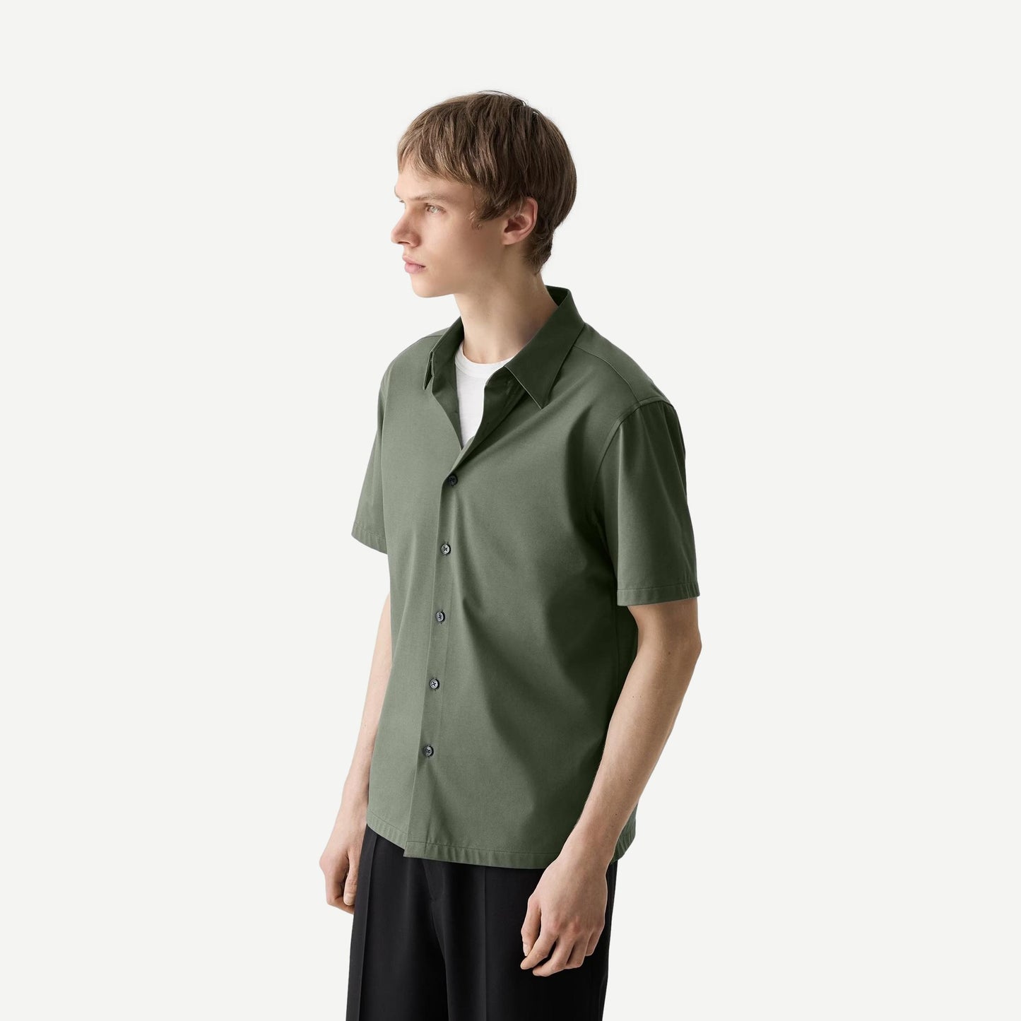 Theory Irving SS shirt in Light Ivy with structure knit fabric, featuring a classic fit and subtle detailing.