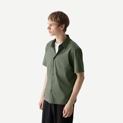 Theory Irving SS shirt in Light Ivy with structure knit fabric, featuring a classic fit and subtle detailing.