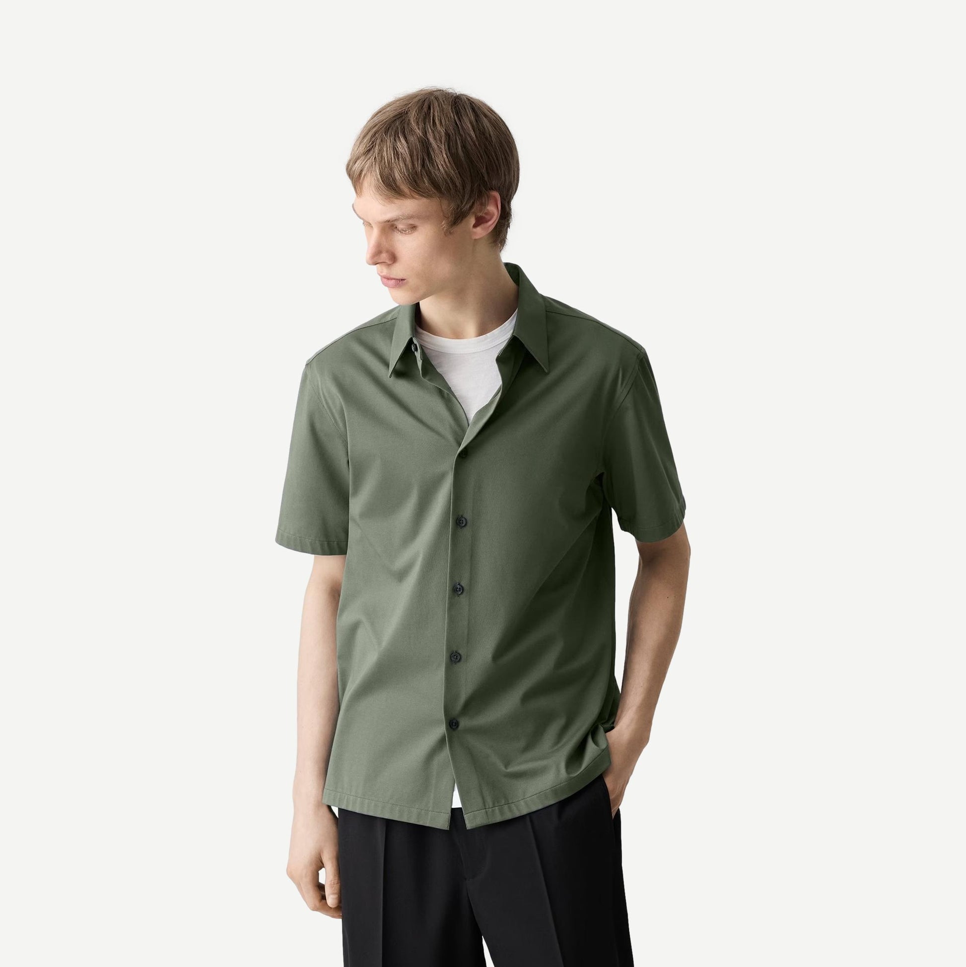 Light Ivy Irving SS shirt by Theory in structure knit fabric, shown in a close-up view highlighting the textured material.