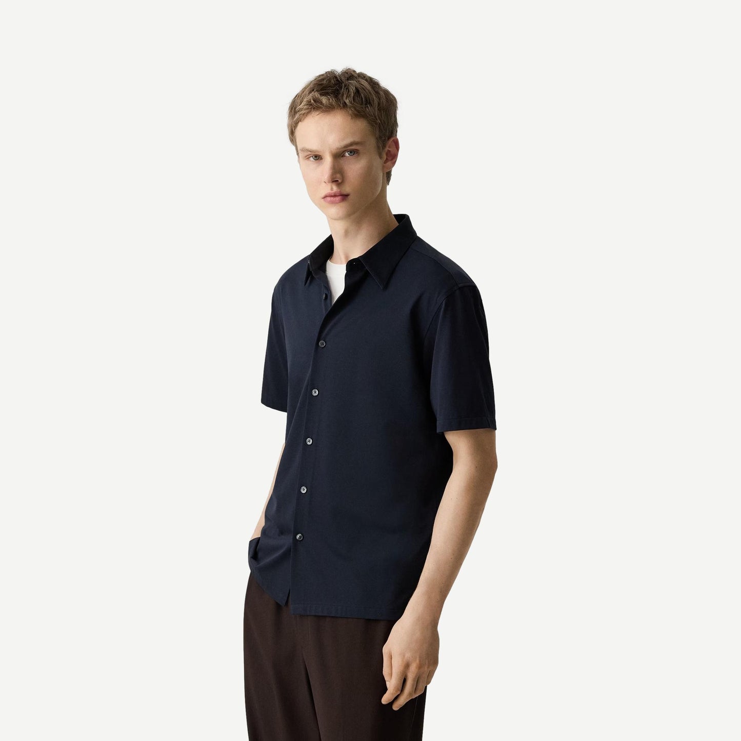 Theory Irving SS shirt in Eclipse Structure Knit, featuring a modern fit and textured fabric, displayed on a hanger.