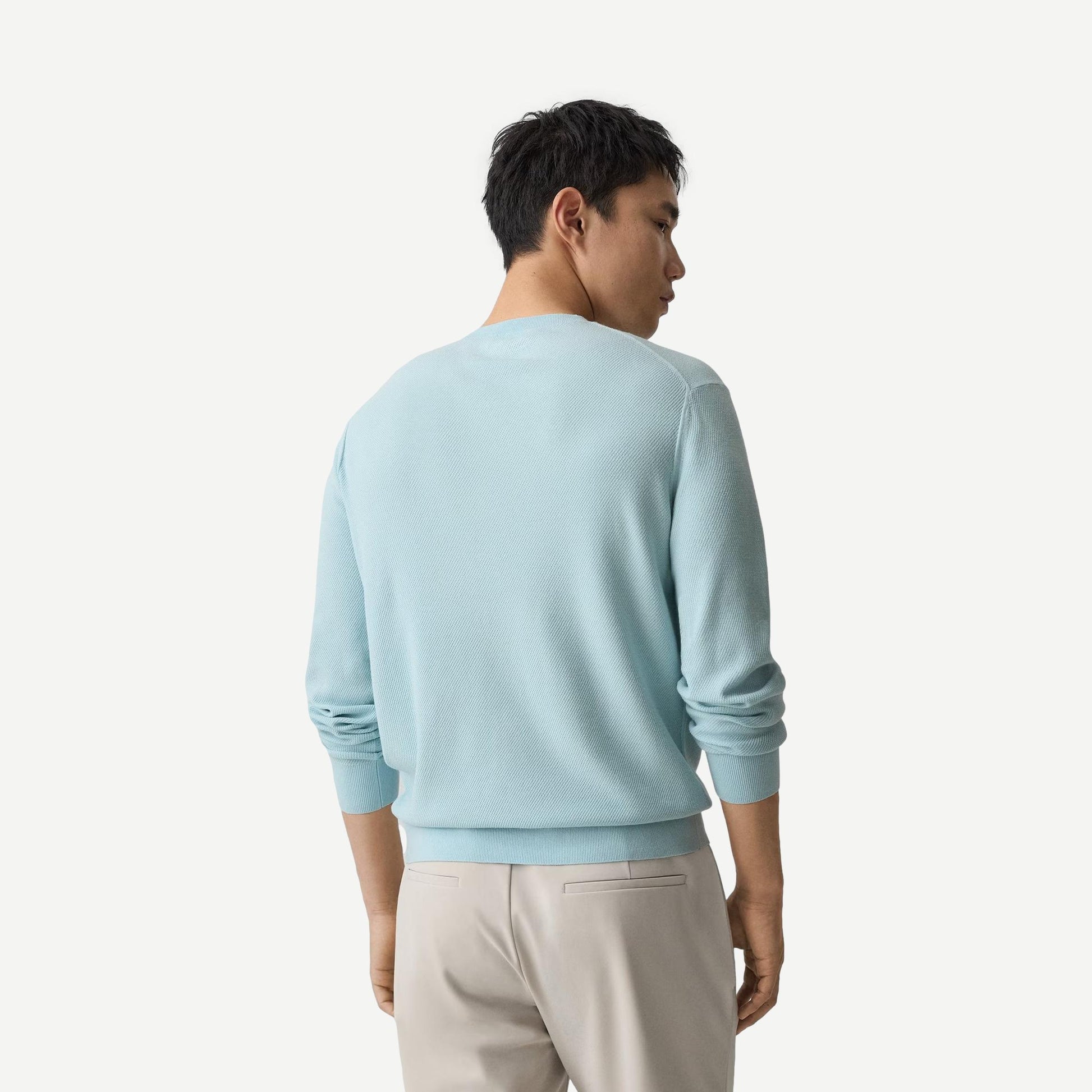 Theory Riland crewneck sweater in Light Ocean Air color, soft knit fabric, close-up of the stylish neckline and texture.
