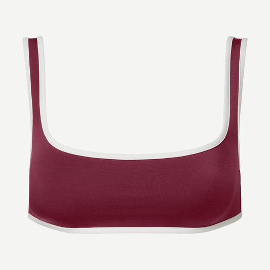 Onia Claire bikini top in dark cherry and egret with a triangle design, featuring adjustable straps and swimwear fabric.