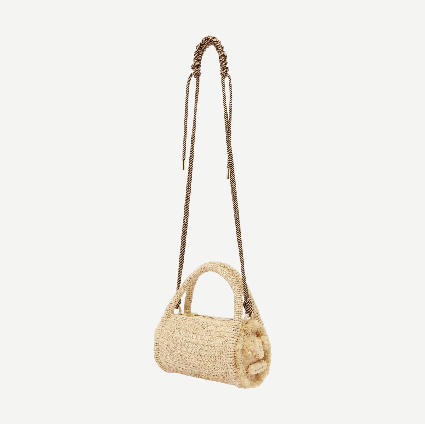Alémais Sunlit Raffia Mini Barrel Bag in blonde with woven texture, compact purse with leather strap and gold hardware.