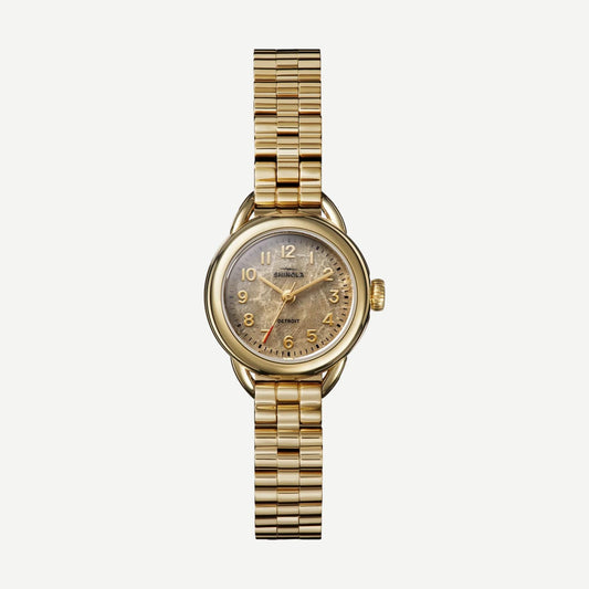 Shinola Runabout 3H 25mm watch with Petoskey and gold band, featuring a sleek, modern design and stainless steel case.