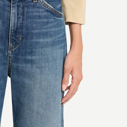 Nili Lotan Tribeca Jean in classic wash denim, showcasing a stylish, slim-fit design with traditional five-pocket styling.