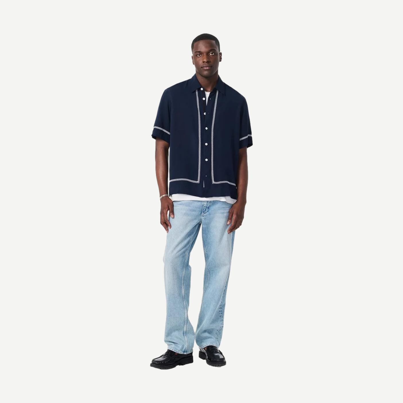 Blue Ezra Stripe Dalton embroidered shirt by Rag and Bone, showing the detailed embroidery and classic striped pattern.